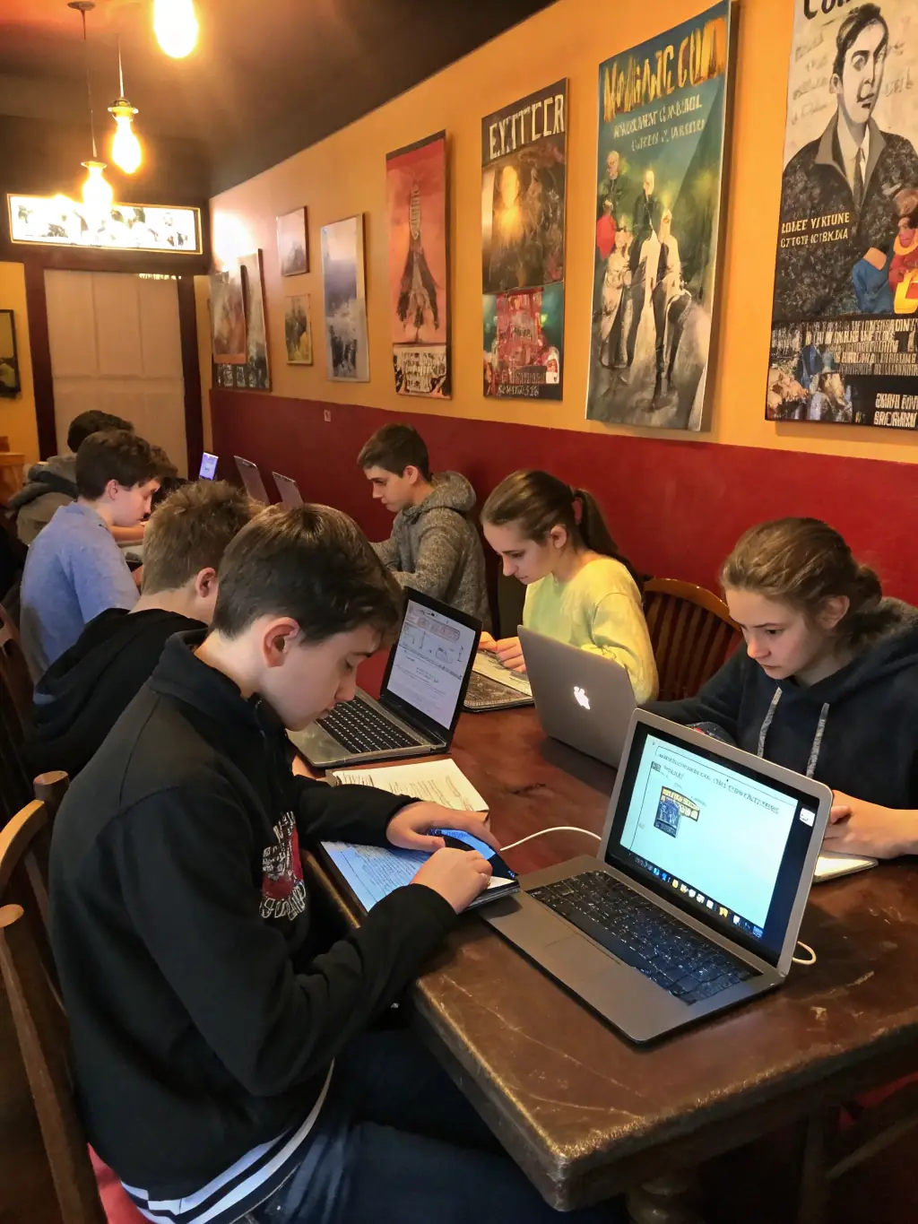 A photograph of teenagers working together on a coding project during a library-sponsored workshop.